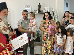 Mother of 10 receives new home and Serbian Church award