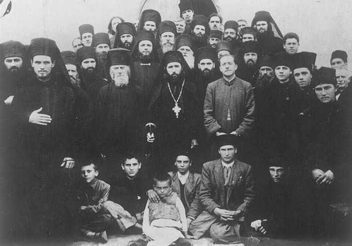The brotherhood of Slatina Monastery. Archimandrite Cleopa is in the middle. 1950