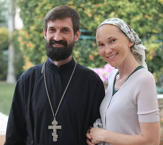 ​Priest Evgeny Shmelev with his wife Anna