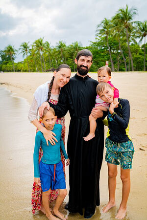 Priest Evgeny Shmelev with his family