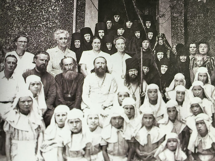 St. John of San Francisco with the nuns of the Theotokos-Vladimir Monastery, Abbess Ariadna (Michurina), clergy, and the wards of the St. Olga Orphanage