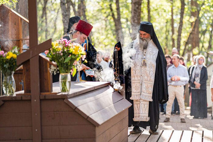Met. Nikolozi serving at the grave of Fr. Seraphim at St. Herman’s Monastery in Platina, CA. Photo: Punks and Monks
