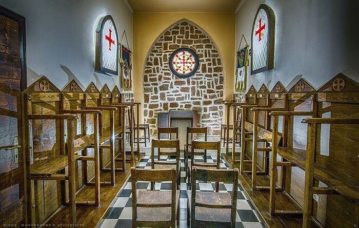 Masonic lodge in Greece, with seats reminiscent of monastery “leaners.”