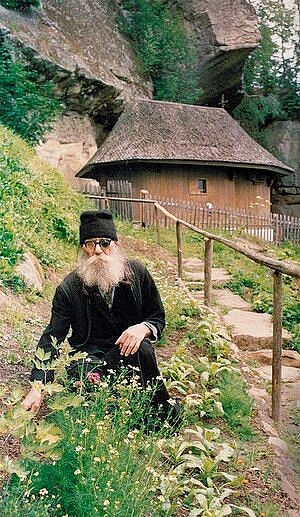 Elder Paisie in the ancient Transfiguration Church at Sihla Skete