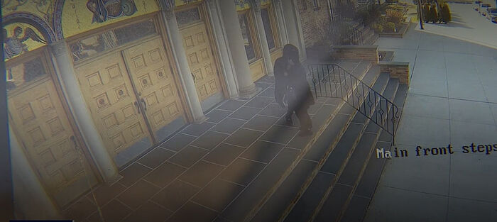 A young man physically attacks an elderly woman at a Greek Orthodox Church in Queens. Photo: Fox 5 New York screenshot